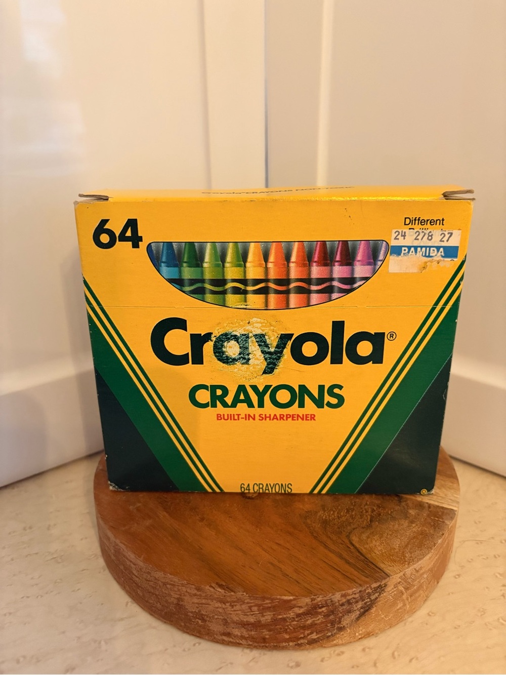 vintage 1990 Crayola 64-count crayon box featuring a built-in sharpener